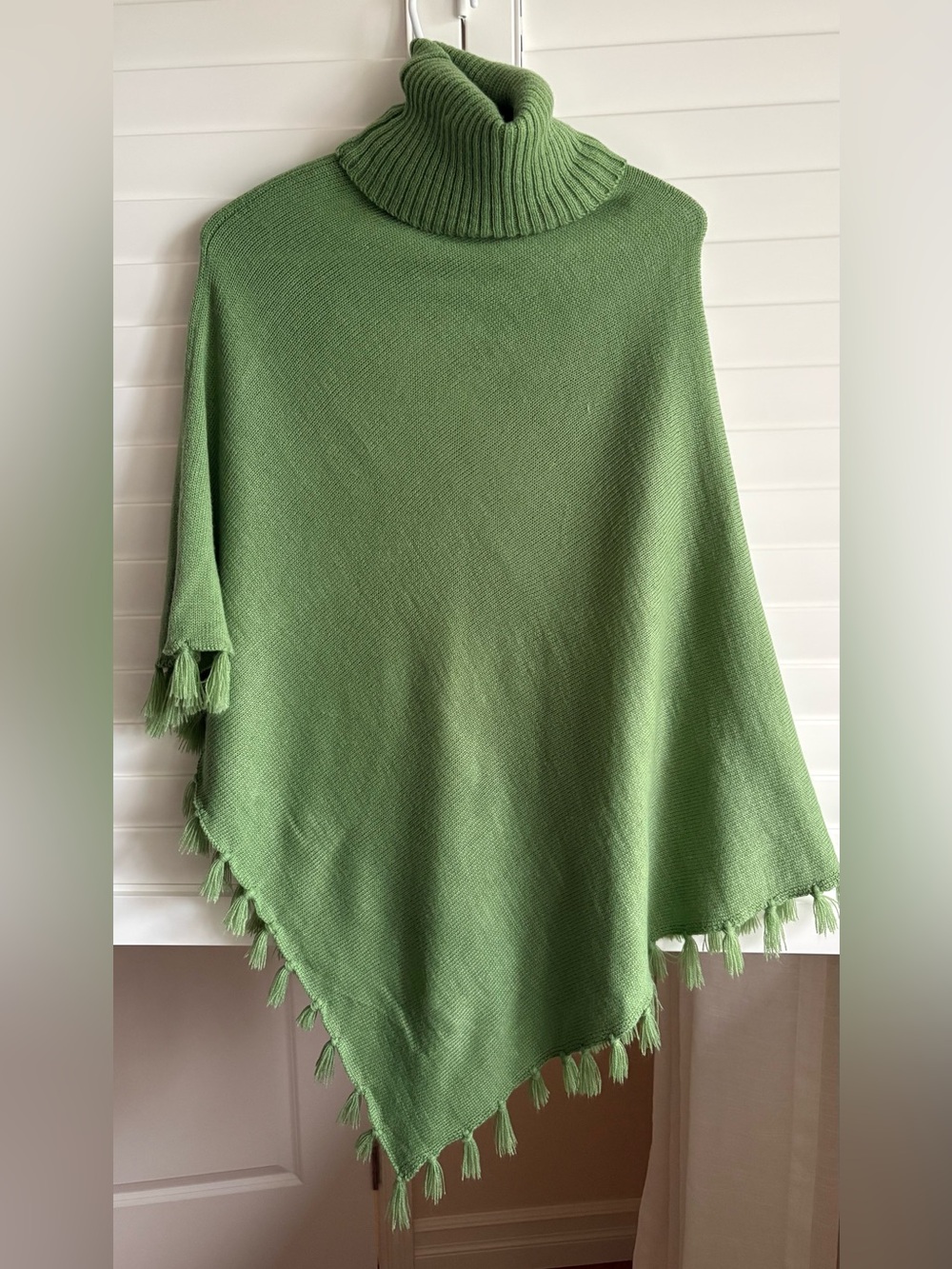 Green knit poncho